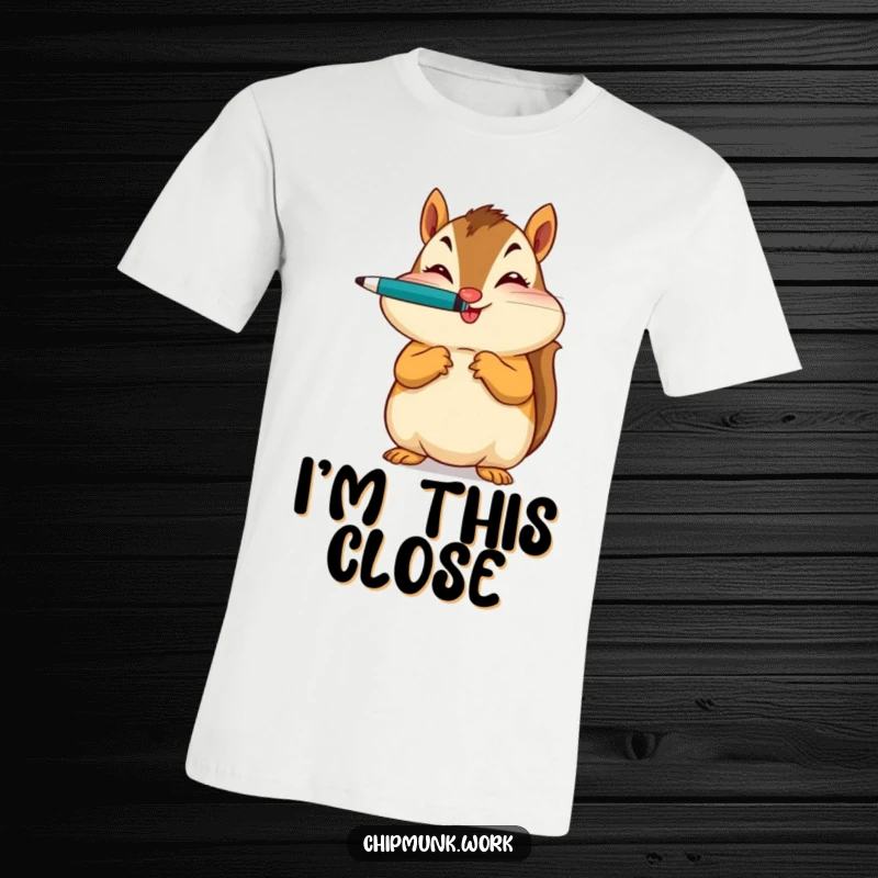 Funny t-shirt showcasing a chipmunk balancing a pen on its nose, winking with a mischievous, intelligent expression.