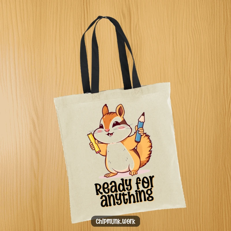 Funny chipmunk tote bag, triumphantly holding a newly sharpened pencil, symbolizing success and the ability to get things done.